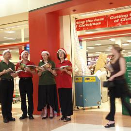 Christmas carol singers in the Broadway Centre, Bay Street Glebe, 2003