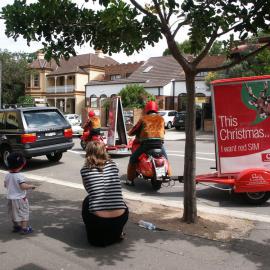 This Christmas I want red SIM advertisements, Glebe Point Road Glebe, 2003