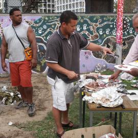 Serving up the earth oven, farewell to Auntie Joyce Ingram, Eveleigh Street Redfern, 2004