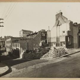 Print - Streetscape with demolished house and buildings, Lower Campbell Street Surry Hills, 1928