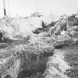 Digging trenches on Anzac Parade Maroubra, 1929