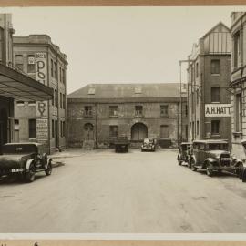 Print - Streetscape with warehouses, Goulburn Street Haymarket, 1937
