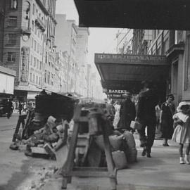 Building materials and pedestrians on Castlereagh Street Sydney, 1935