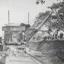 Steam shovel operating on College Street, Hyde Park South Sydney, 1928