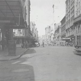 View from corner Bridge Street to unsurfaced George Street Sydney, 1932