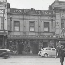 Shops in George Street, hawker with basket, George Street Haymarket, 1942