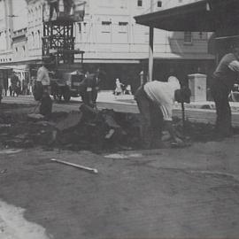 Removal of old woodblocks, corner George and Goulburn Streets Sydney, 1931
