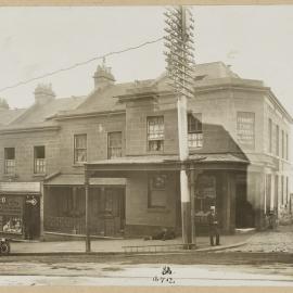 Print - Streetscape with commercial businesses and shops, corner of William and Duke Streets Woolloomooloo, 1912
