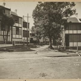 Print - Streetscape with houses, corner of Harford Place and Womerah Avenue Potts Point, 1922
