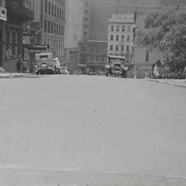 View down the street before regrading, Margaret Street Sydney, Sydney, 1932
