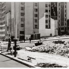 Workmen asphalting intersection of Martin Place extension, Elizabeth Street Sydney, 1934