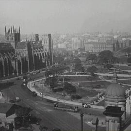 Aerial view of north east corner Hyde Park North and St Mary's Cathedral, Sydney 1930