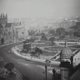 Aerial view of north east corner Hyde Park North and Street Mary's Cathedral, Sydney, 1930