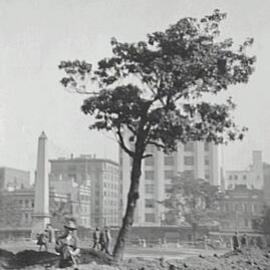 Man digging trench excavations for Hyde Park South reconstruction, Sydney, 1933