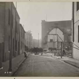 Print - Streetscape with demolition work in Clarence Lane Sydney, 1921