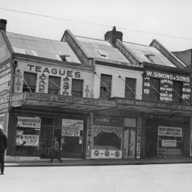 View of buildings and policeman on duty, George Street West and Wattle Street Broadway, 1935