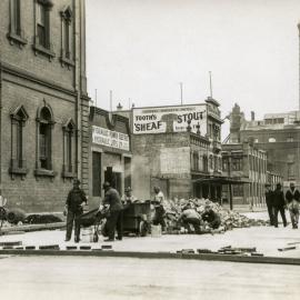 Looking west at roadworks and workmen, Pier Street Haymarket, 1932