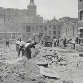 View showing Trades Hall Building and roadworks, Pier Street Haymarket, 1932