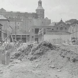 View showing Trades Hall Building and roadworks, Pier Street Haymarket, 1932