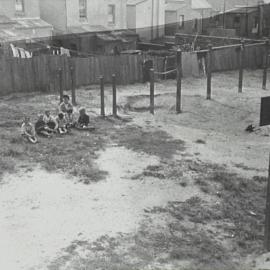 Children in playground before its conversion, Alexander and Phelps Streets Surry Hills, circa 1930