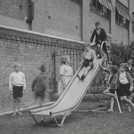 Children on slides, Camperdown Park Children's Playground, Australia Street Camperdown, 1935