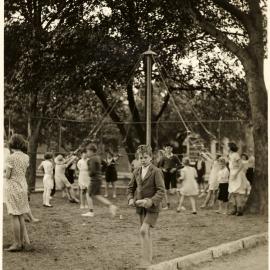 Children playing giant stride at Camperdown Park Children's Playground, Australia Street Camperdown, 1935