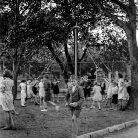 Children playing giant stride at Camperdown Park Children's Playground, Australia Street Camperdown, 1935