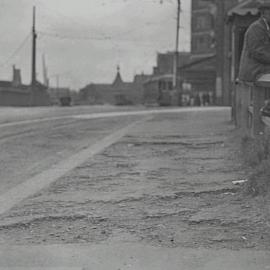 View showing deteriorated footpath before repair, Railway Square, Lee Street Sydney, 1935