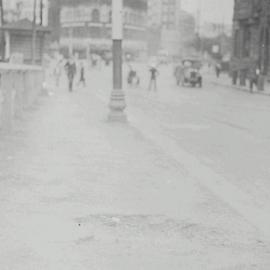 View showing deteriorated footpath before repair, Railway Square, Lee Street Sydney, 1935