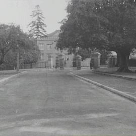 Cahill Expressway roadworks, Government House gates, Royal Botanic Garden, Sydney, 1956