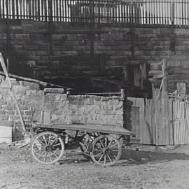 Horse drawn table-top wagon and dilapidated out buildings, Point Street Pyrmont, 1954