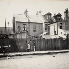Print - Streetscape with buildings on rear of Bourke Street Woolloomooloo, circa 1921