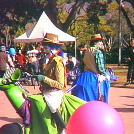 Street performers at Pins in the Park, Hyde Park North, Sydney, 2000
