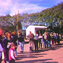 Queue for merchandise at Pins in the Park, Hyde Park North, Sydney, 2000