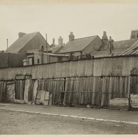 Print - Streetscape with buildings near College and University Street Camperdown, 1922