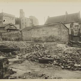 Print - Vacant block and buildings from Castlereagh Lane Surry Hills, 1922