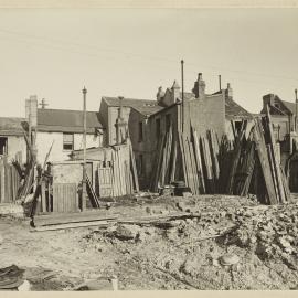 Print - Demolition site and houses on East Street Surry Hills, 1922