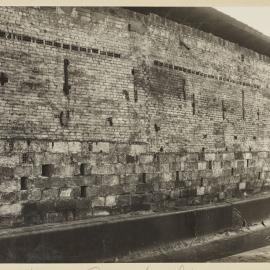 Print - Exterior wall of Grace Bros Stables, 1923