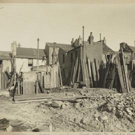 Print - Demolition site and houses on East Street Surry Hills, 1922