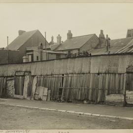 Print - Streetscape with buildings near College and University Street Camperdown, 1922