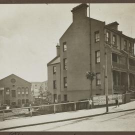 Print - White and Sons boot factory and terrace houses on Flinders Street Surry Hills, 1916