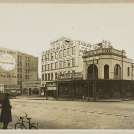 Print - Streetscape with business on George Street West from Shepherd Street Chippendale, 1933