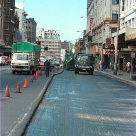 Road resurfacing in Elizabeth Street Sydney, 1980