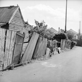 Collapsed fence, corner of Edward Street and Eglington Lane Glebe, 1951