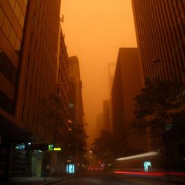 City buildings in the orange haze of an early morning dust storm, Pitt Street Sydney, 2009