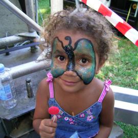 Child with face painted at Yabun, Redfern Park Redfern, 2005