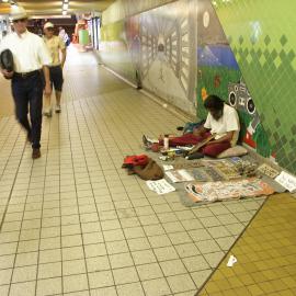 Buskers, Aboriginal artist displaying examples of work, Devonshire Street Tunnel Surry Hills, 2004