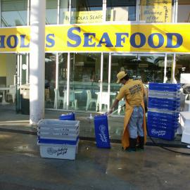 Fish market's employee hosing tubs, Bank Street Pyrmont, 2003