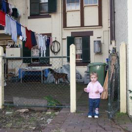 Pyrmont child in backyard, Ways Terrace Pyrmont, 2003