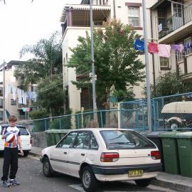 Boy playing on the street, Ways Terrace Pyrmont 2004